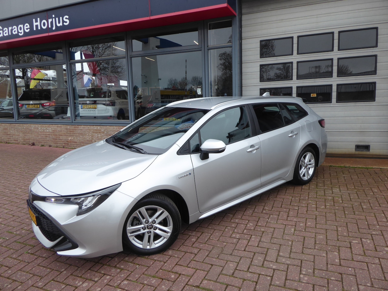 Toyota Corolla Touring Sports - 1.8 Hybrid Active Aut. dec-2021 CLIMA, CRUISE, APPLE CARPLAY, CAMERA, LMV, NW STAAT! - AutoWereld.nl