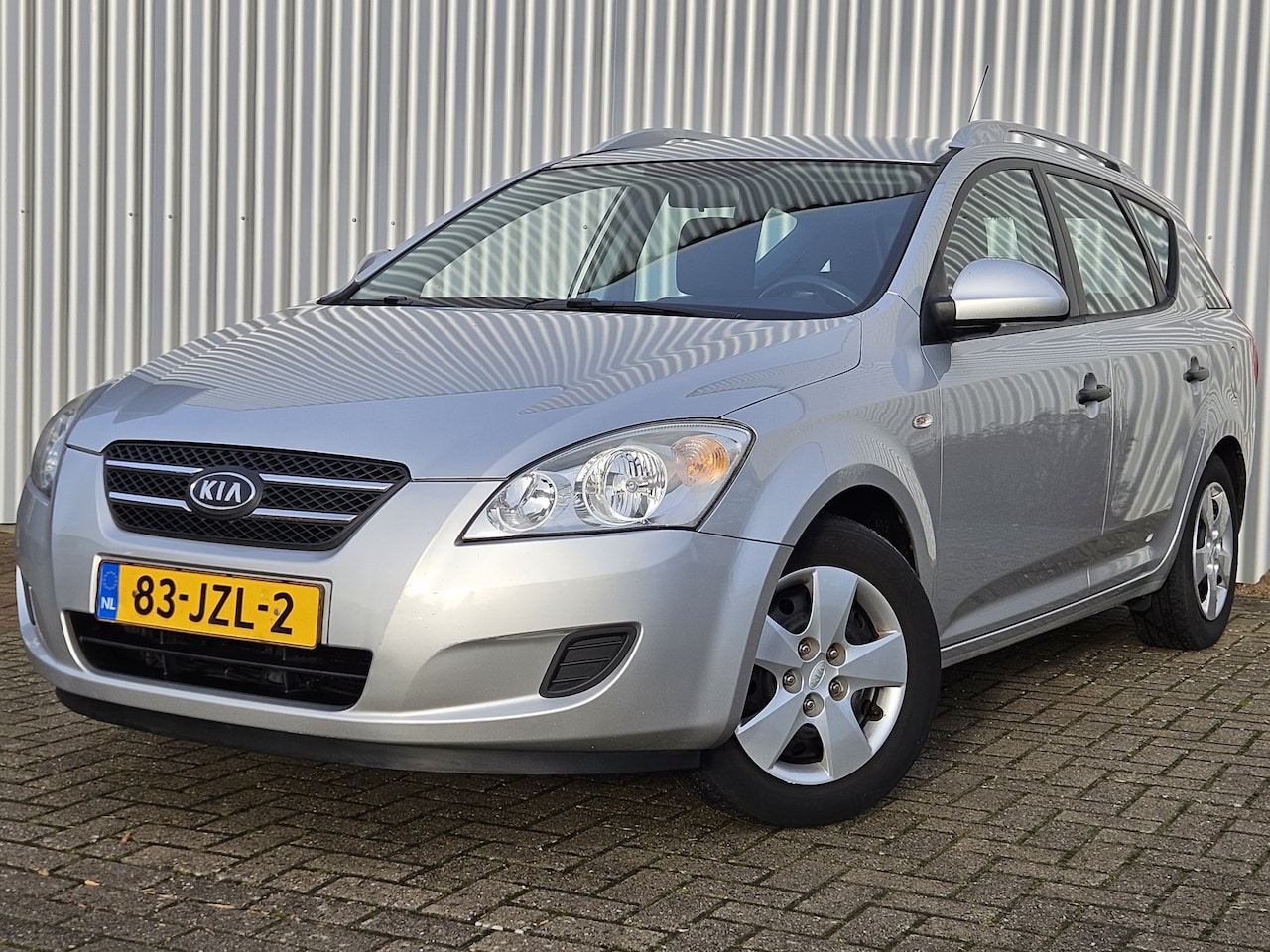 Kia Cee'd Sporty Wagon - 1.4 CVVT X-tra / Airco / Origineel NL! - AutoWereld.nl