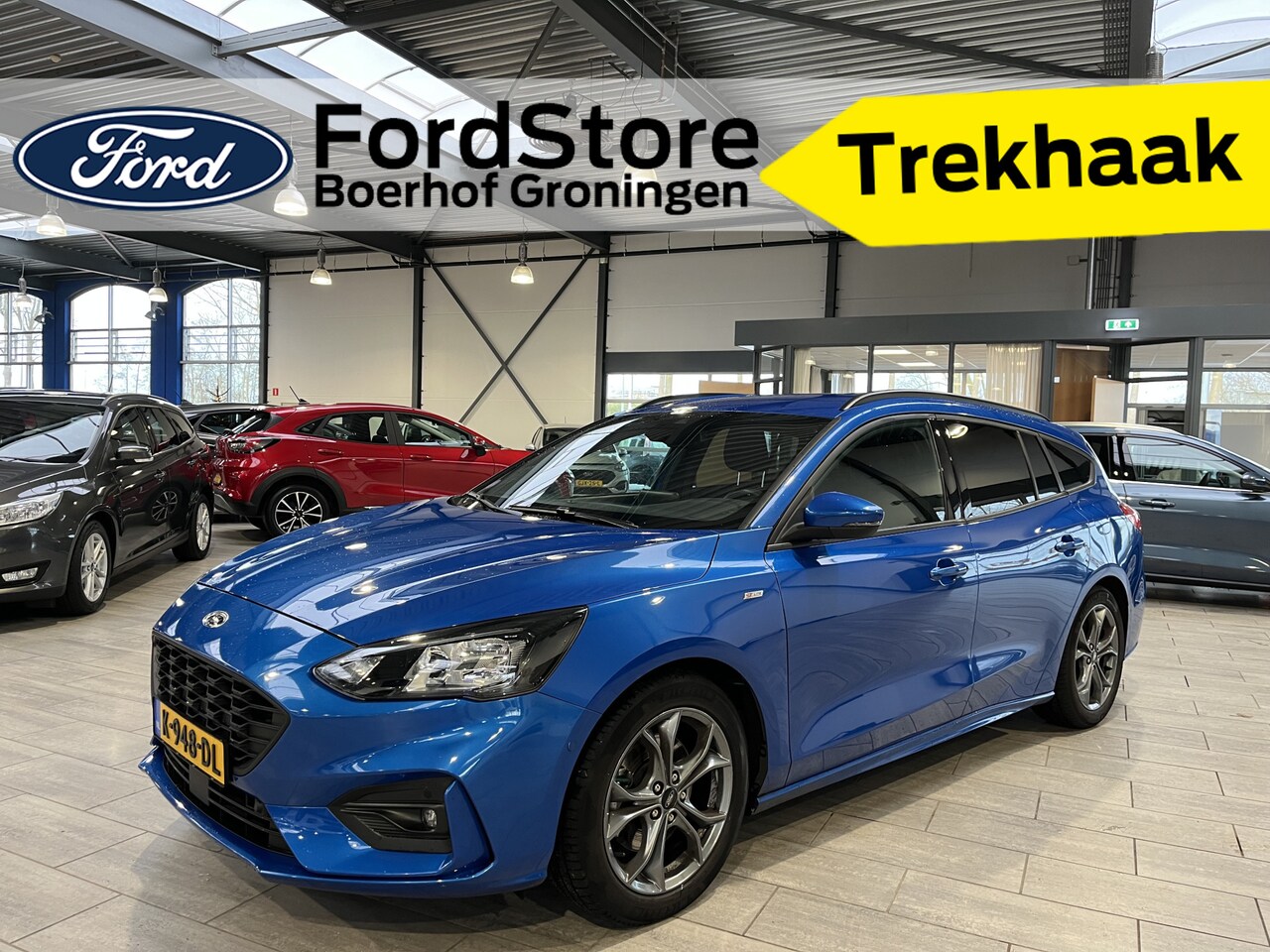 Ford Focus Wagon - EcoBoost Hybrid 125 pk ST Line | Trekhaak | Camera | LED | Navi | Clima | Cruise | Keyless - AutoWereld.nl