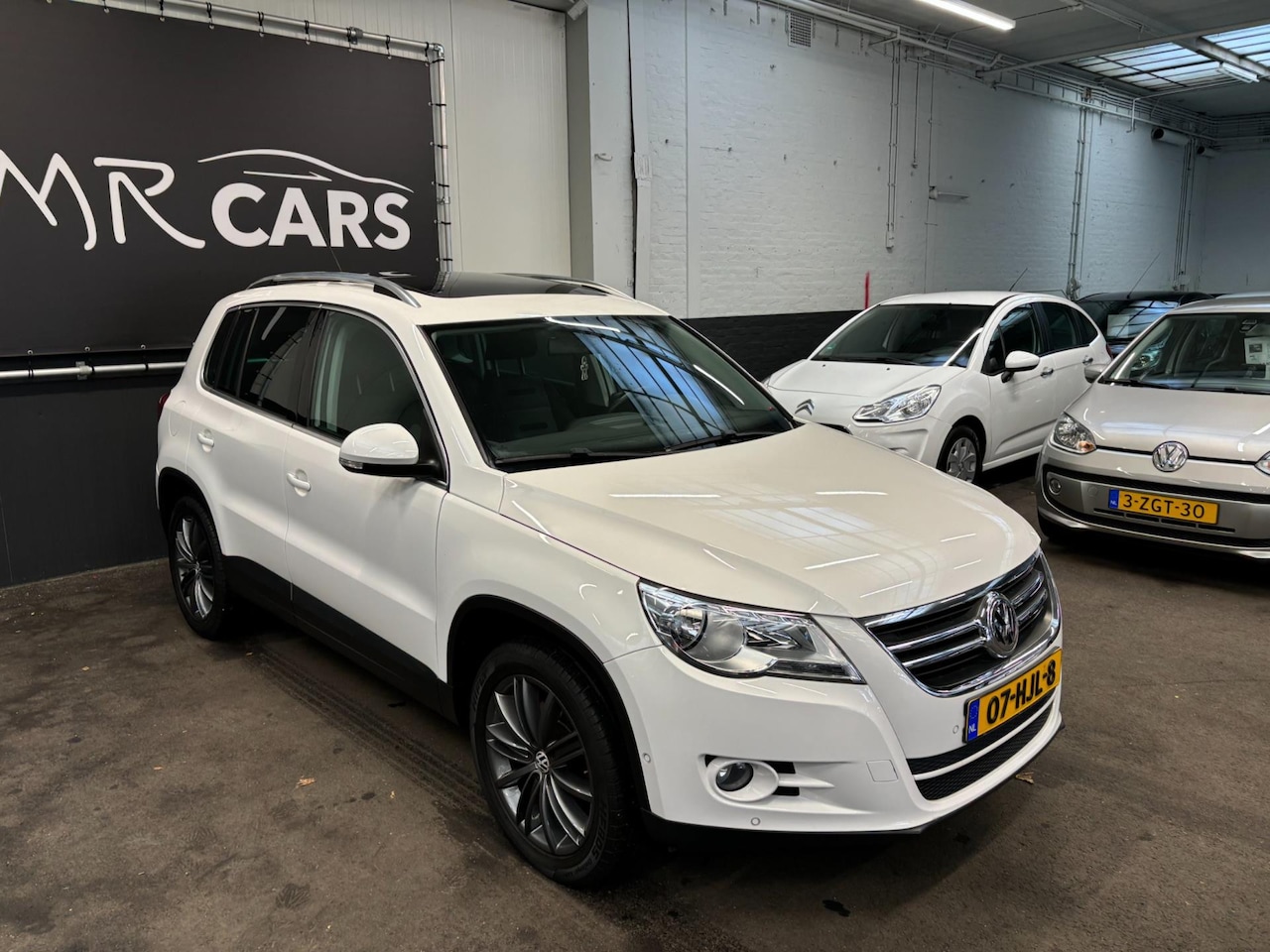 Volkswagen Tiguan - 1.4 TSI Sport&Style 4Motion Panodak/Stoelverwarming. - AutoWereld.nl