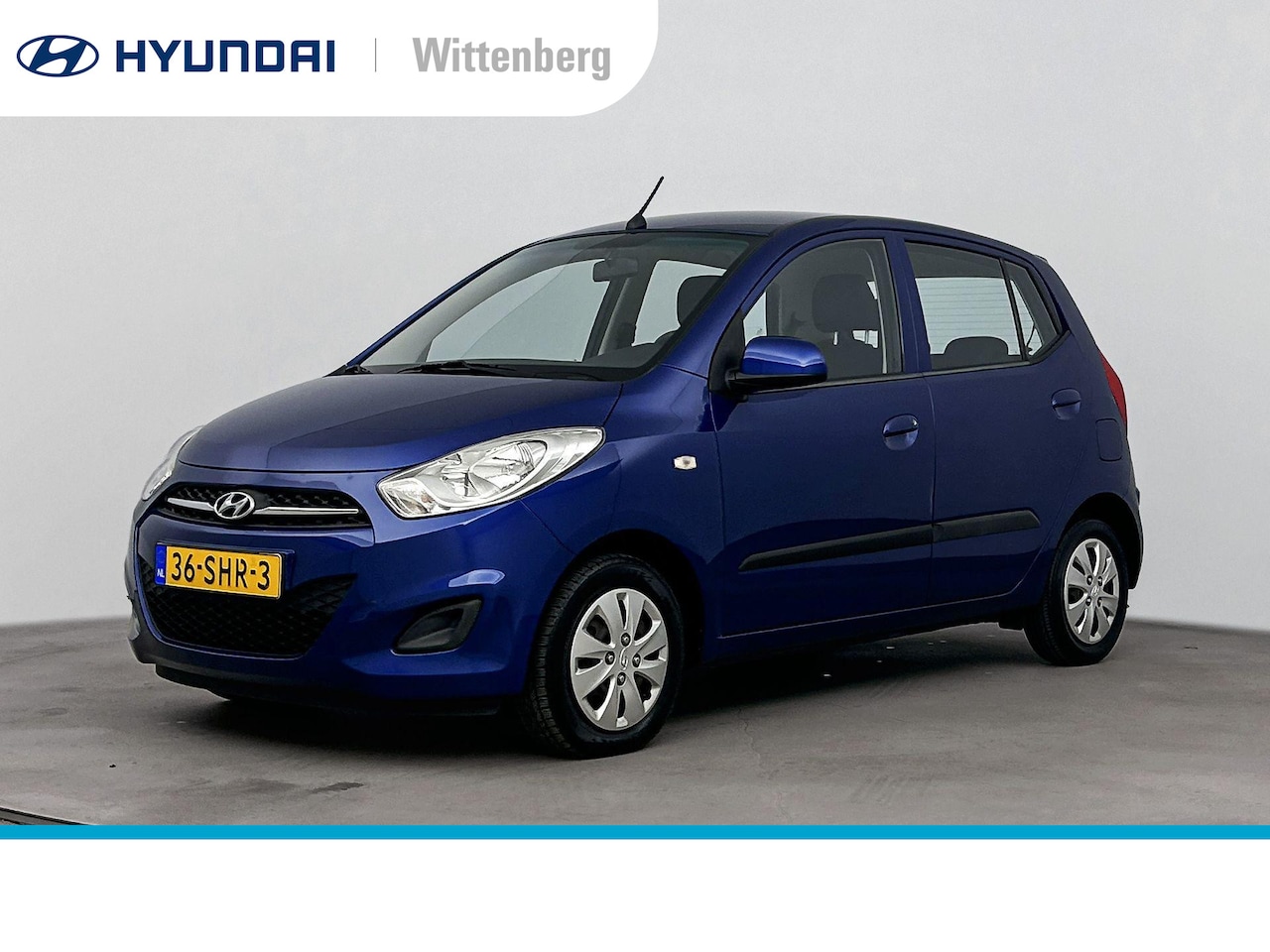 Hyundai i10 - 1.1 i-Drive Cool | Lage km-stand! | Airco | El. bed. ramen | Bovag garantie | - AutoWereld.nl