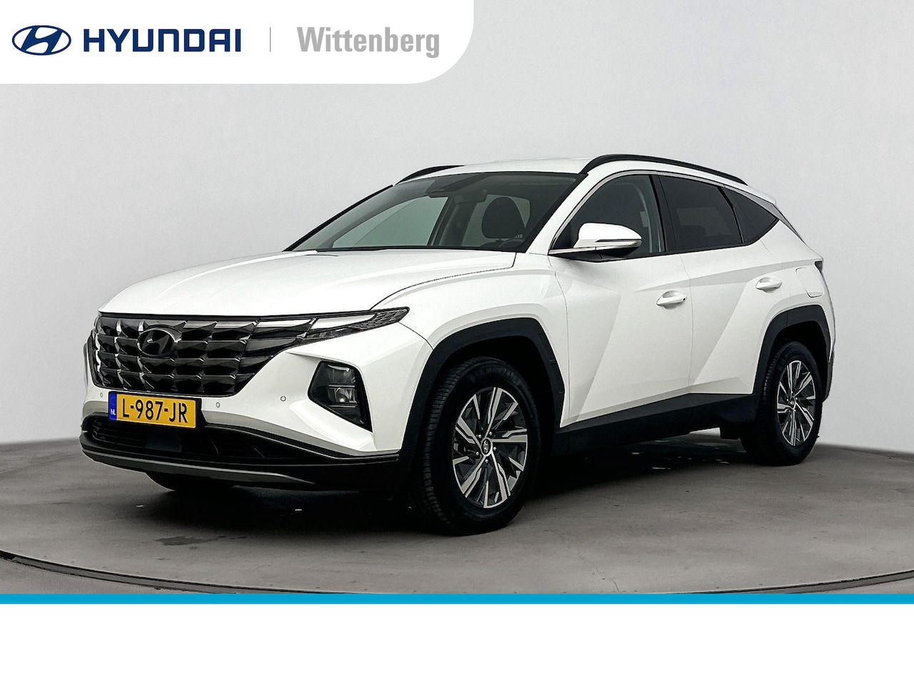 Hyundai Tucson - 1.6 T-GDI HEV Comfort | Lage km-stand! | Stoelverwarming | Trekhaak | Trekgewicht 1650kg | - AutoWereld.nl