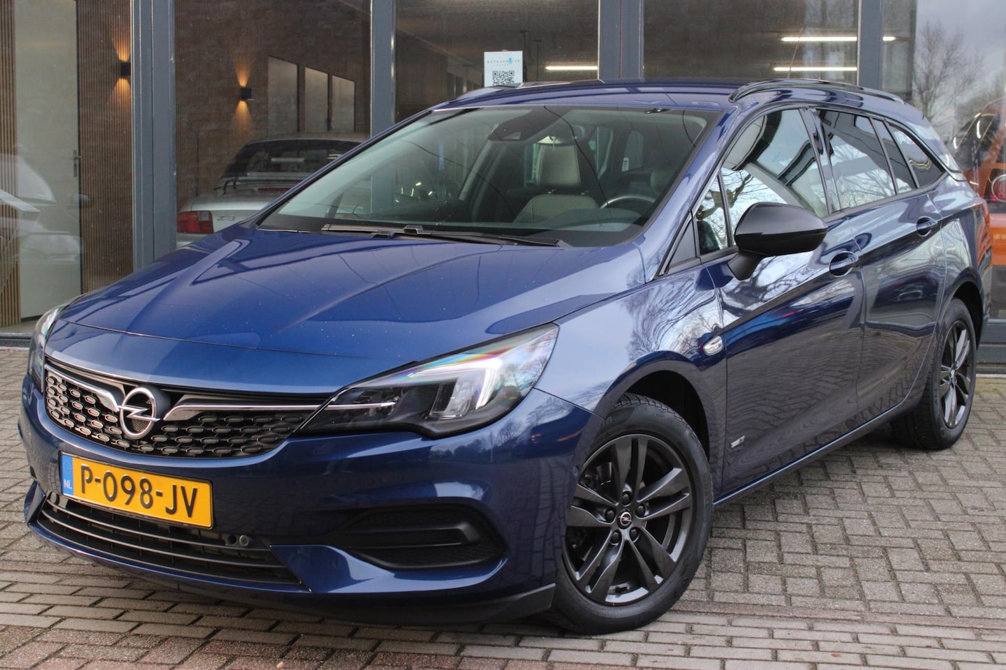 Opel Astra Sports Tourer - 1.2 Business Elegance | Cruise Control | Achteruitrijcamera | Dodehoekdetectie | Telefoonv - AutoWereld.nl