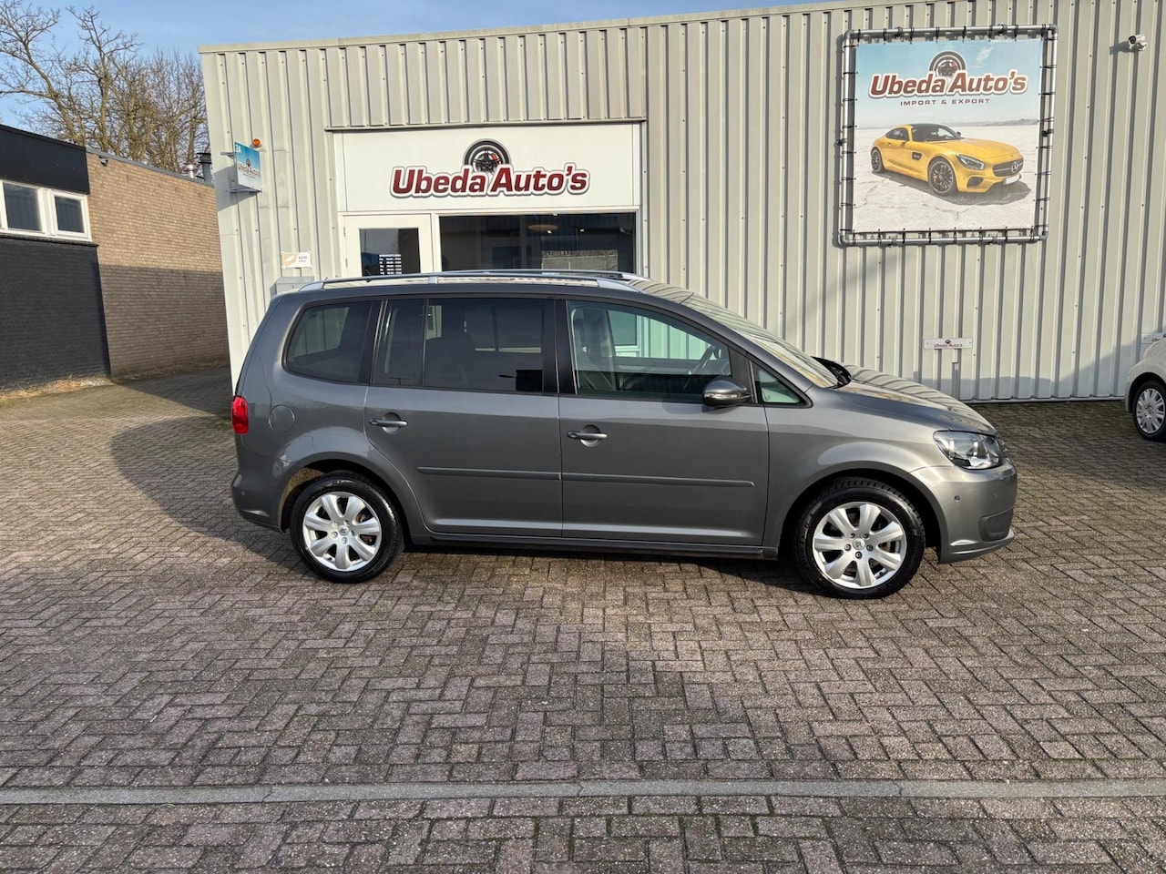 Volkswagen Touran - 1.6 TDI Highline BlueMotion km 147384-6999e - AutoWereld.nl