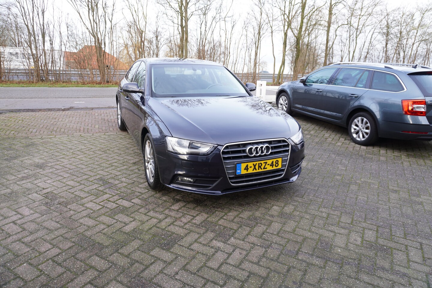 Audi A4 Limousine - 1.8 TFSI Business Edition TREKHAAK NAVIGATIE CRUISE - AutoWereld.nl