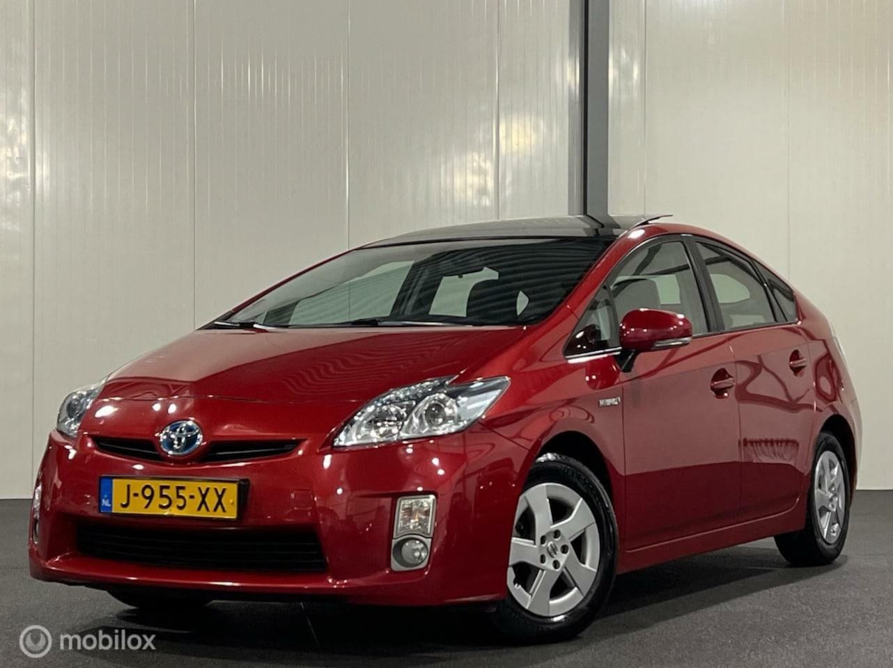 Toyota Prius - 1.8 Comfort [ historie panorama climate navigatie ] - AutoWereld.nl