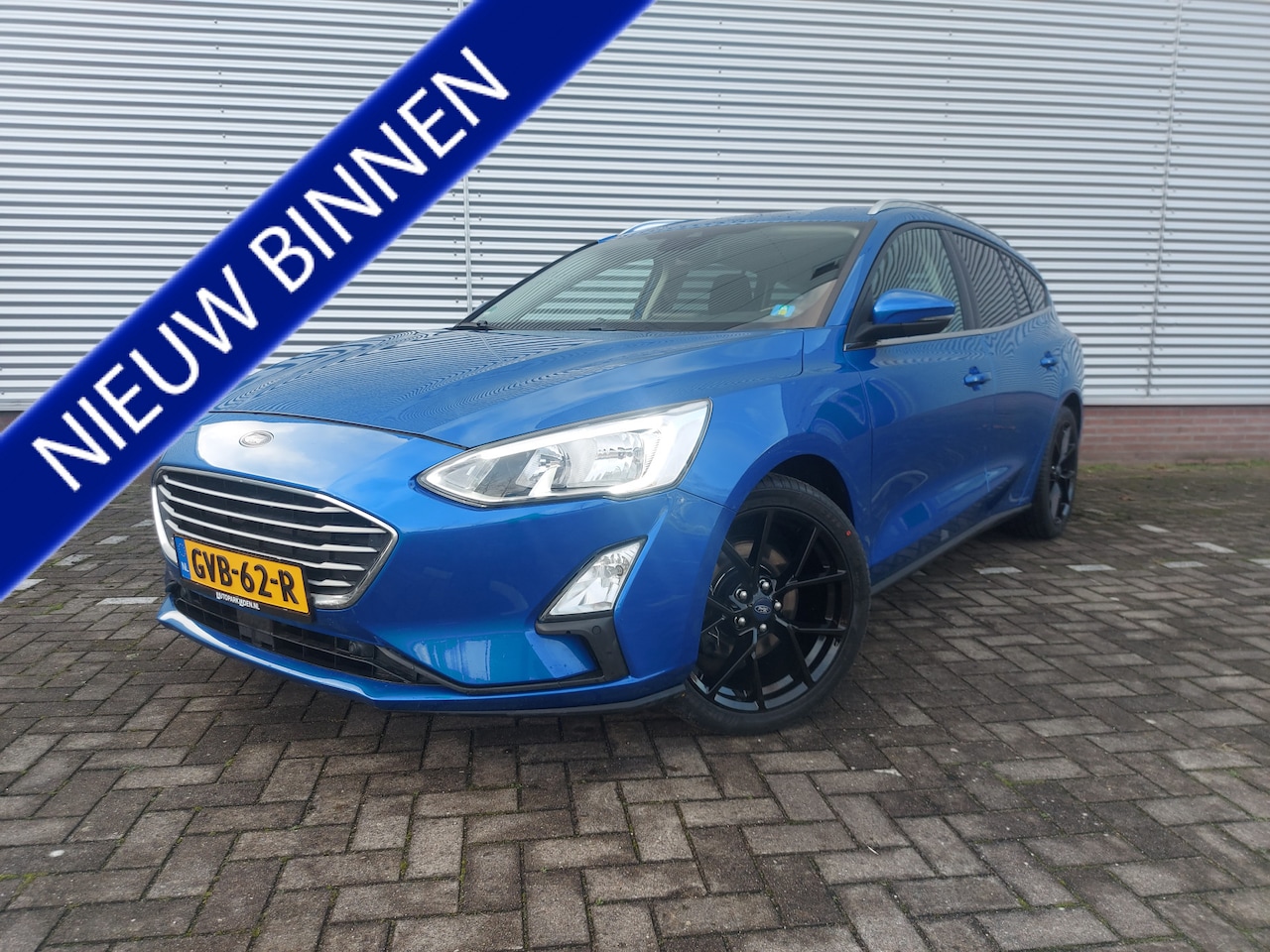 Ford Focus Wagon - 1.0 EcoBoost Titanium Business Automaat, airco,cruise,afneembare trekhaak,navigatie,parkee - AutoWereld.nl