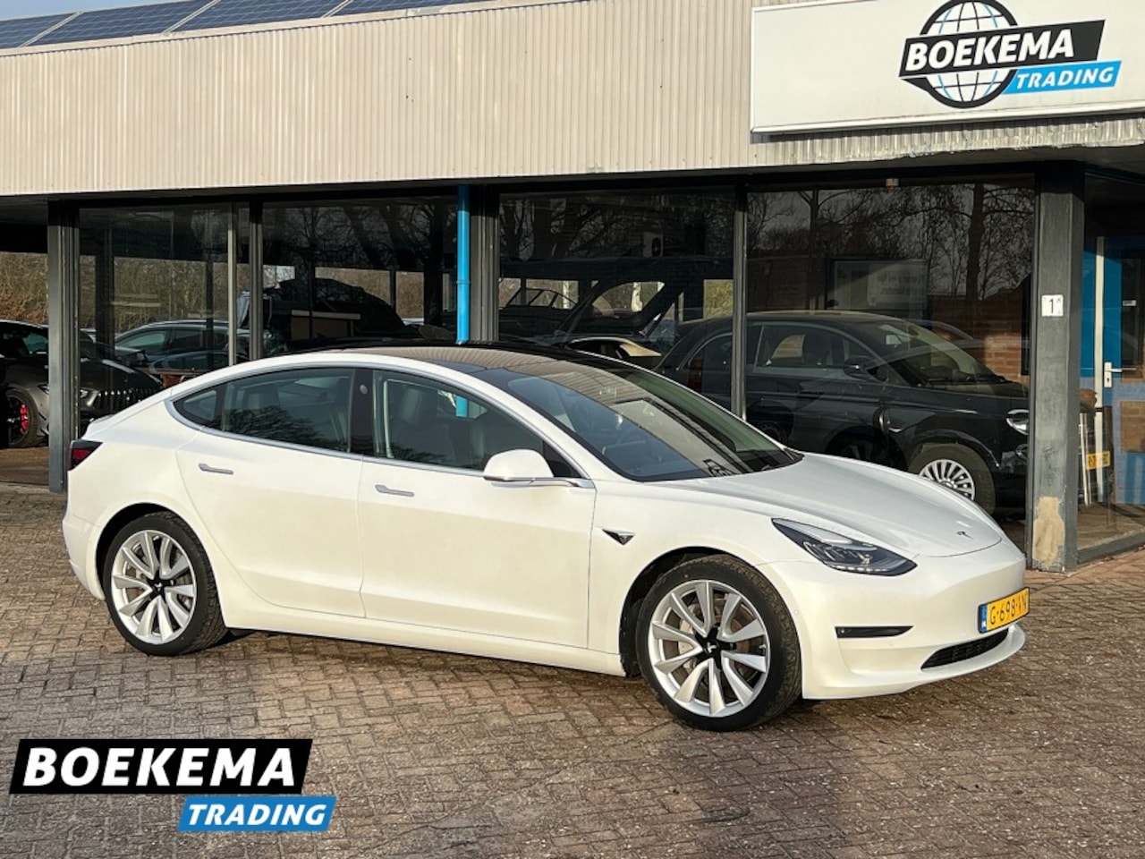 Tesla Model 3 - Long Range RWD Long Range AWD 75 kWh Full-Self Drive Pano SHZ Leder - AutoWereld.nl