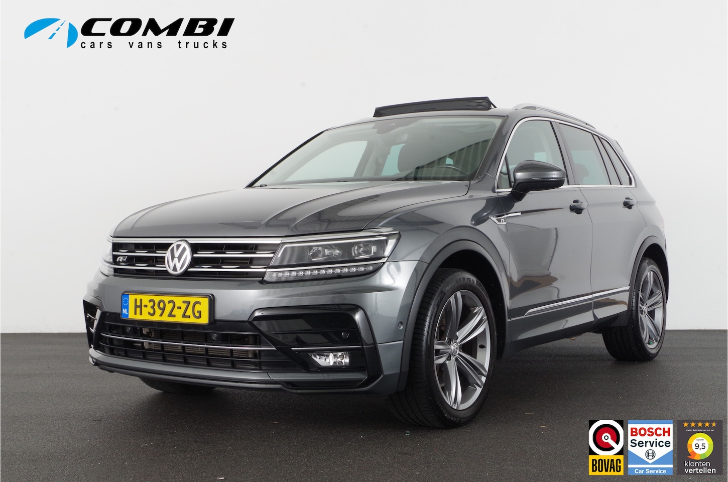 Volkswagen Tiguan - 2.0 TSI 4Motion R-Line > 230pk/pano.schuif/trekhaak/camera/Indium Grey... - AutoWereld.nl