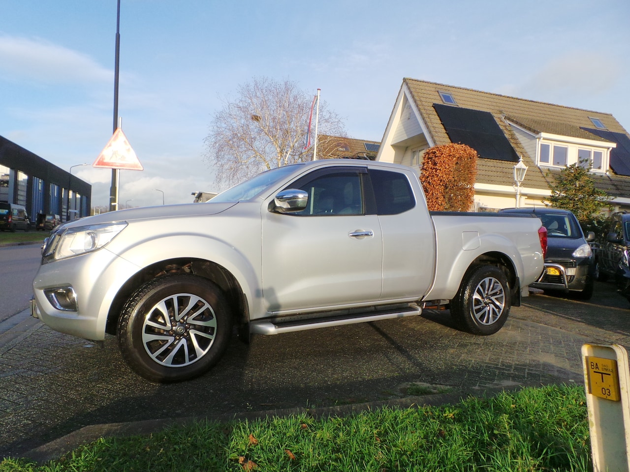 Nissan Navara - 2.3 dCi 4X4 N-Connecta King Cab Airco,Cruise,Navigatie,Lm velgen,Enz 3500kg trekken - AutoWereld.nl