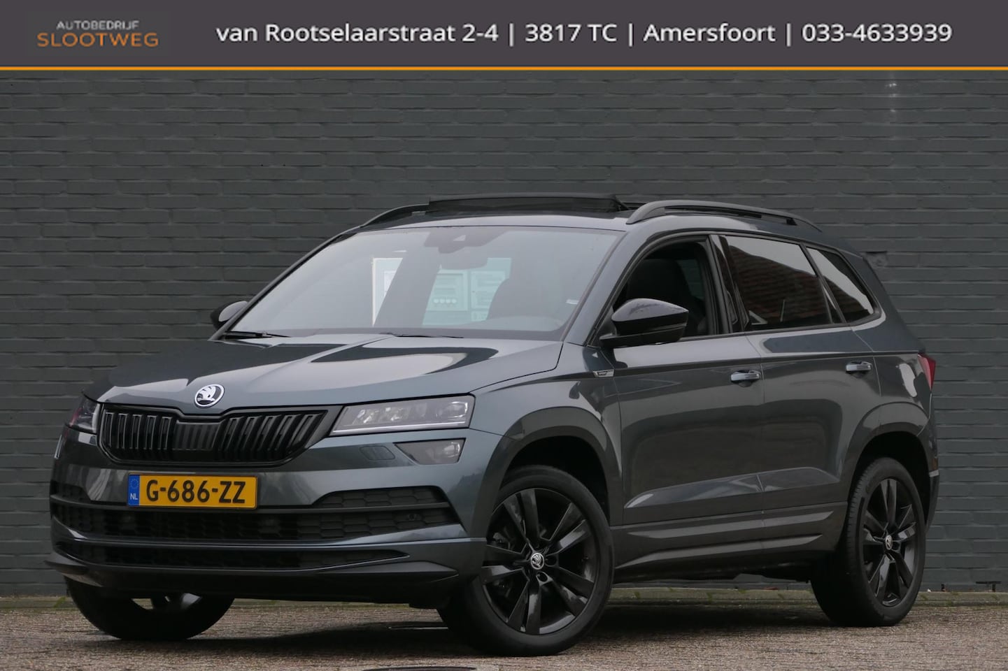 Skoda Karoq - 1.5 TSI ACT Sportline Panoramadak | Virtual | Canton | ACC - AutoWereld.nl