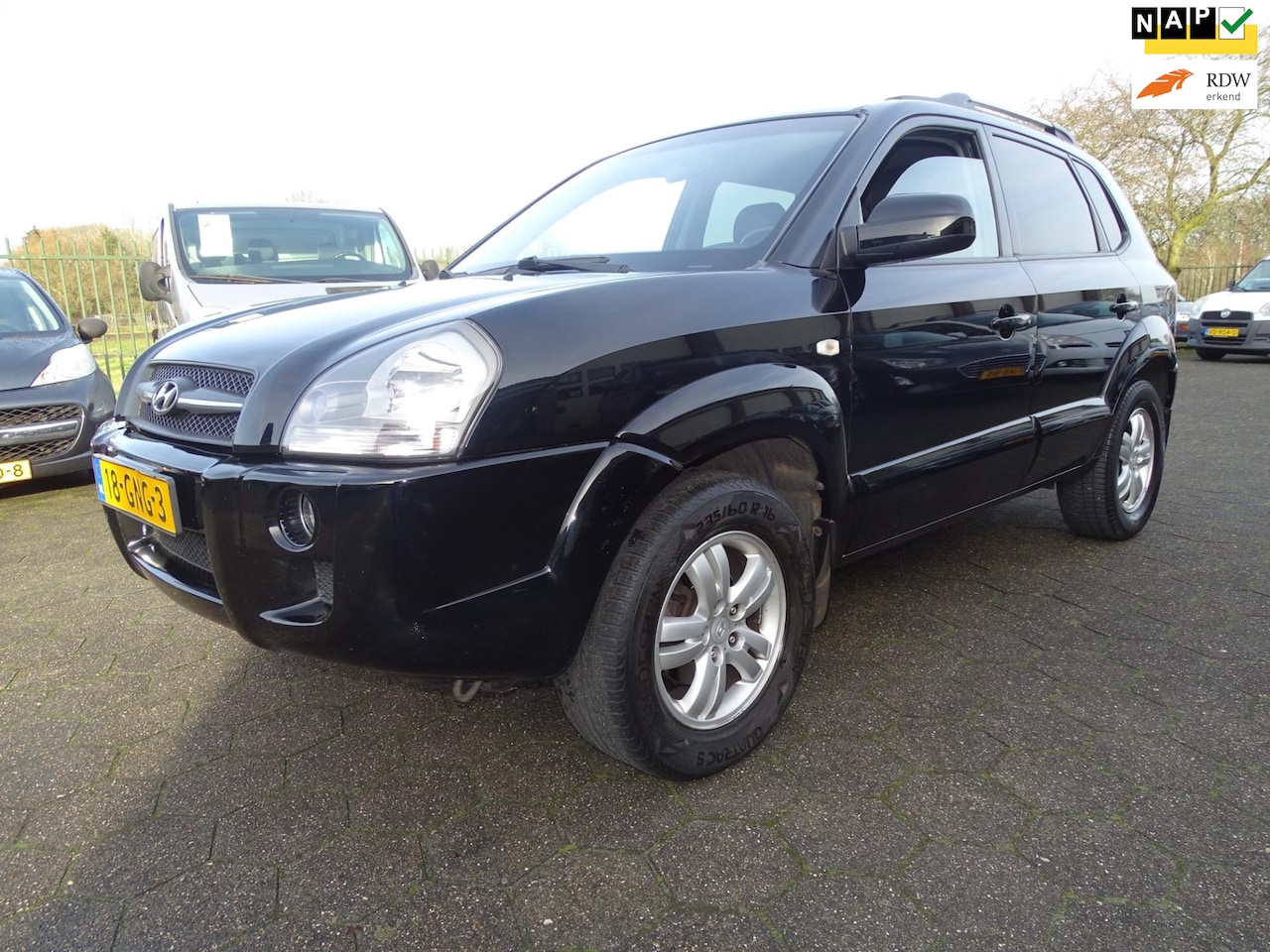 Hyundai Tucson - 2.0i Style Supreme ECC/LMV/TREKHAAK - AutoWereld.nl