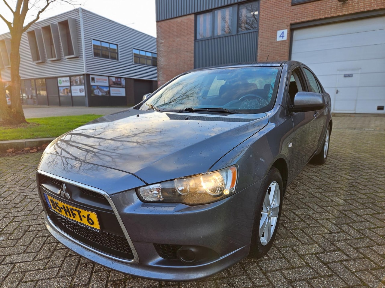 Mitsubishi Lancer Sportback - 1.8 Invite 1.8 Invite - AutoWereld.nl