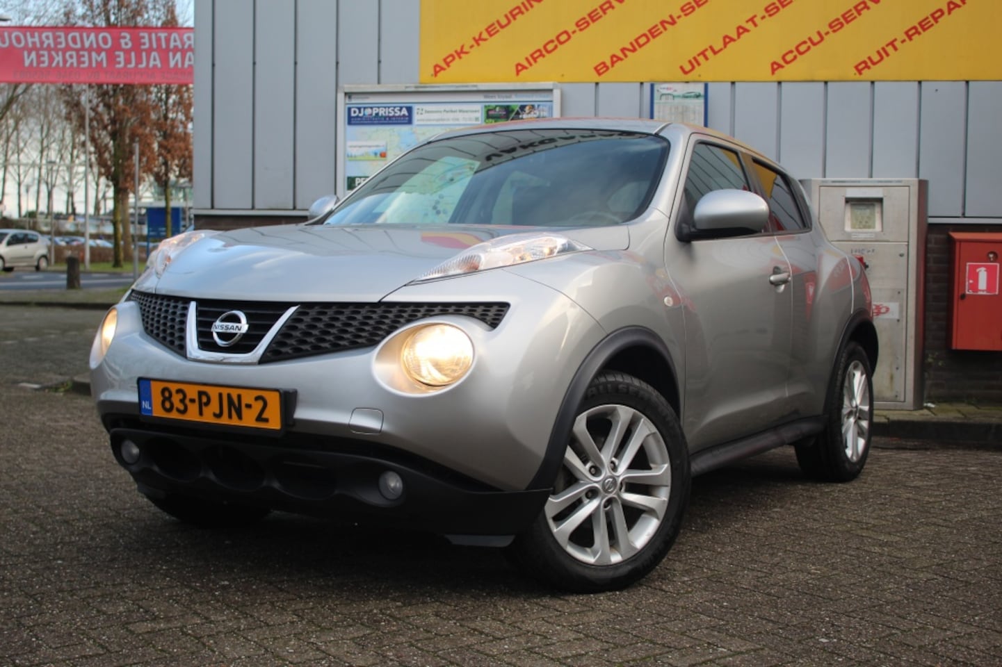 Nissan Juke - 1.6 Tekna | NAP | Automaat | Camera | Leer | - AutoWereld.nl