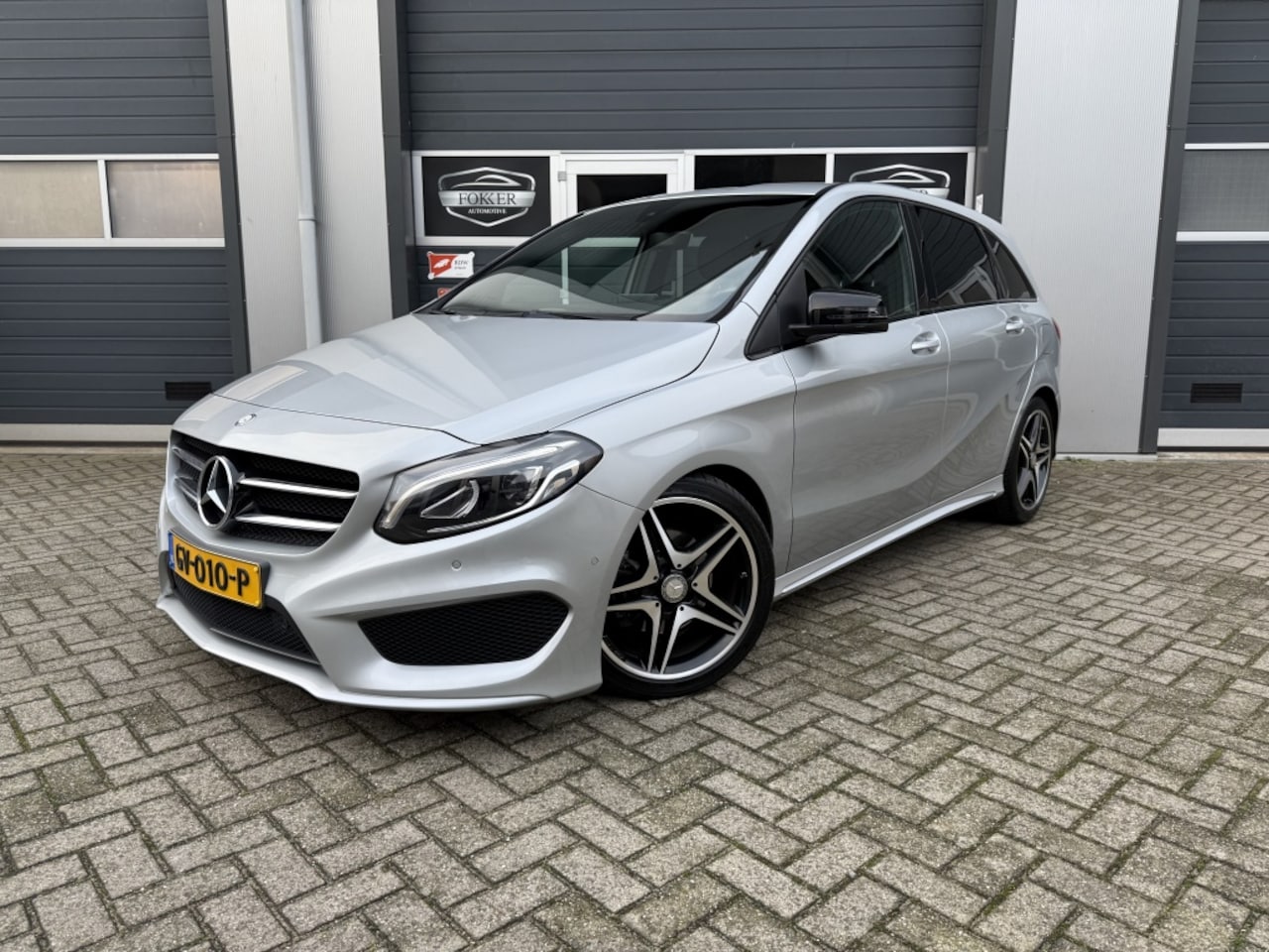 Mercedes-Benz B-klasse - 180 Ambition AMG NAP Automaat PDC Cruise NAVI Dealer OH - AutoWereld.nl