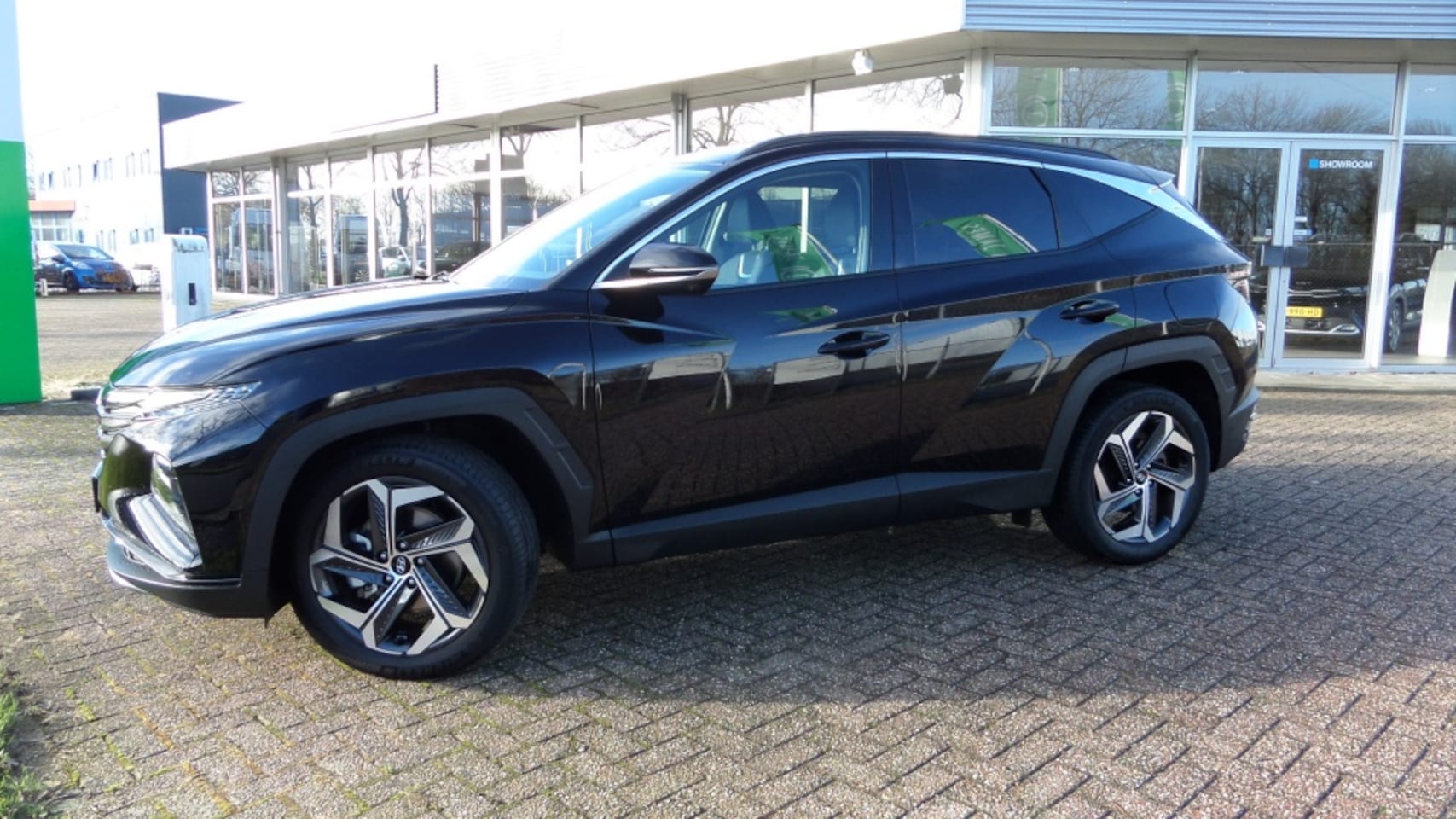 Hyundai Tucson - 1.6 T-GDI HEV Premium 1.6 T-GDI HEV Premium - AutoWereld.nl