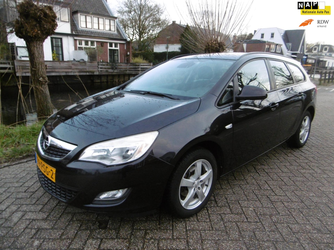 Opel Astra Sports Tourer - 1.4 Turbo Edition 140pk Airco Cruise Trekhaak - AutoWereld.nl