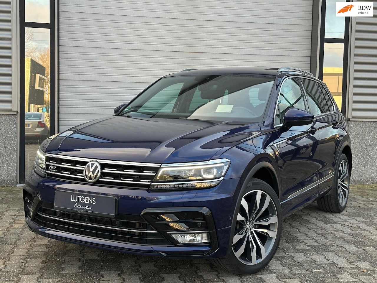 Volkswagen Tiguan - 2.0 TSI 4Motion R-line Pano HUB trekhaak - AutoWereld.nl