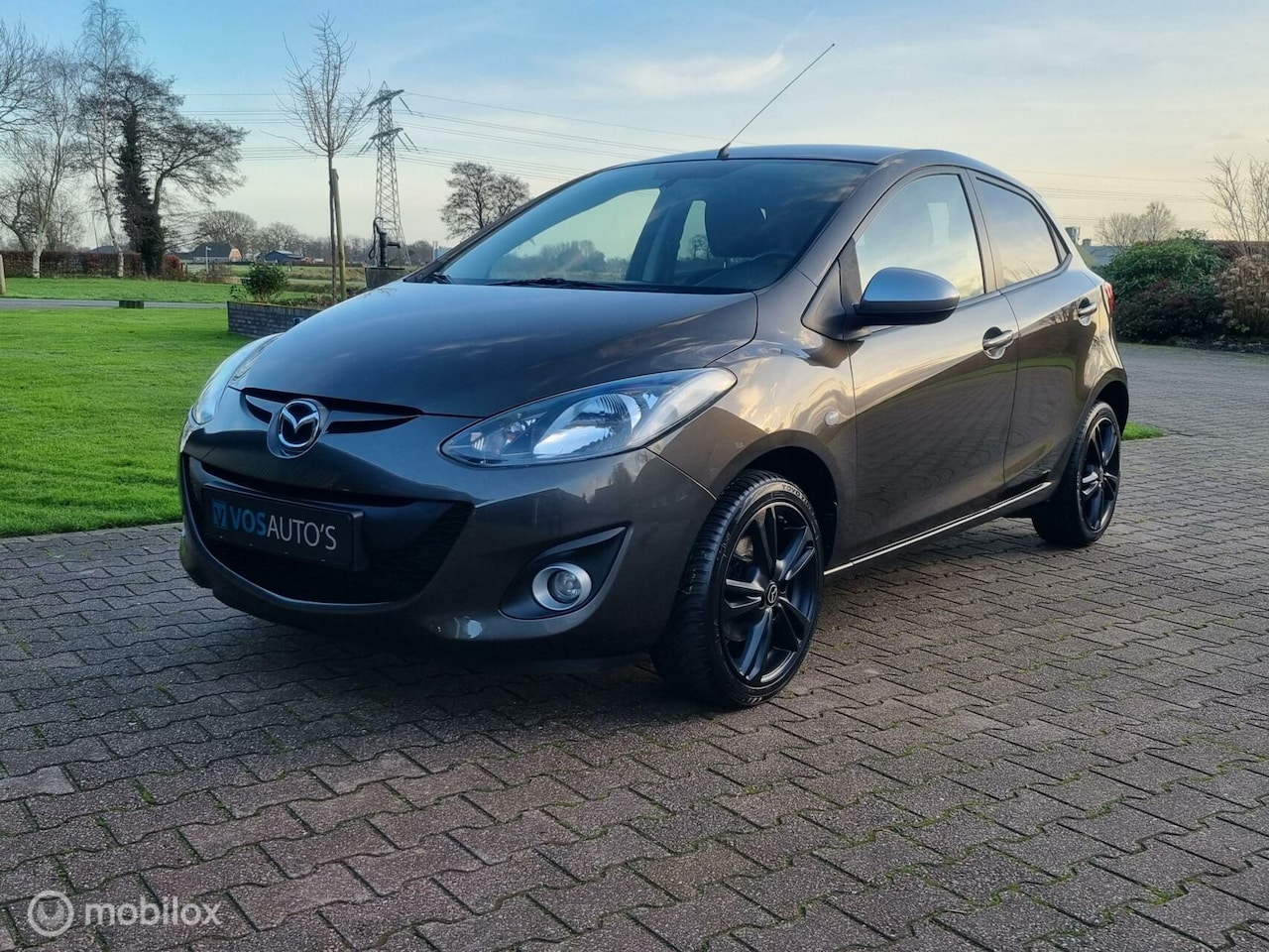 Mazda 2 - 1.3 Silver Edition/NAVI/16 INCH/STOELVERW./CLIMA - AutoWereld.nl