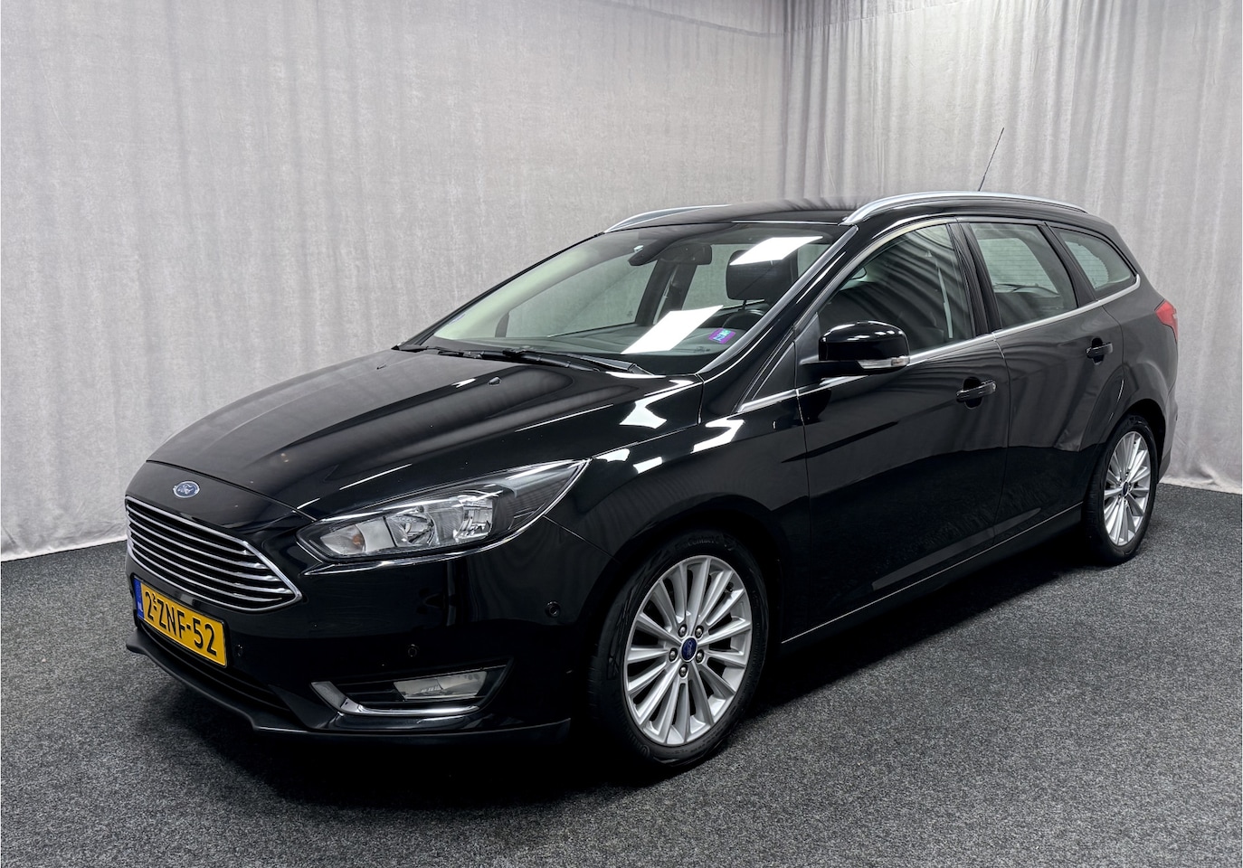 Ford Focus Wagon - 1.0 Titanium Edition | Navi | Airco | Cruise | Park Assist | - AutoWereld.nl