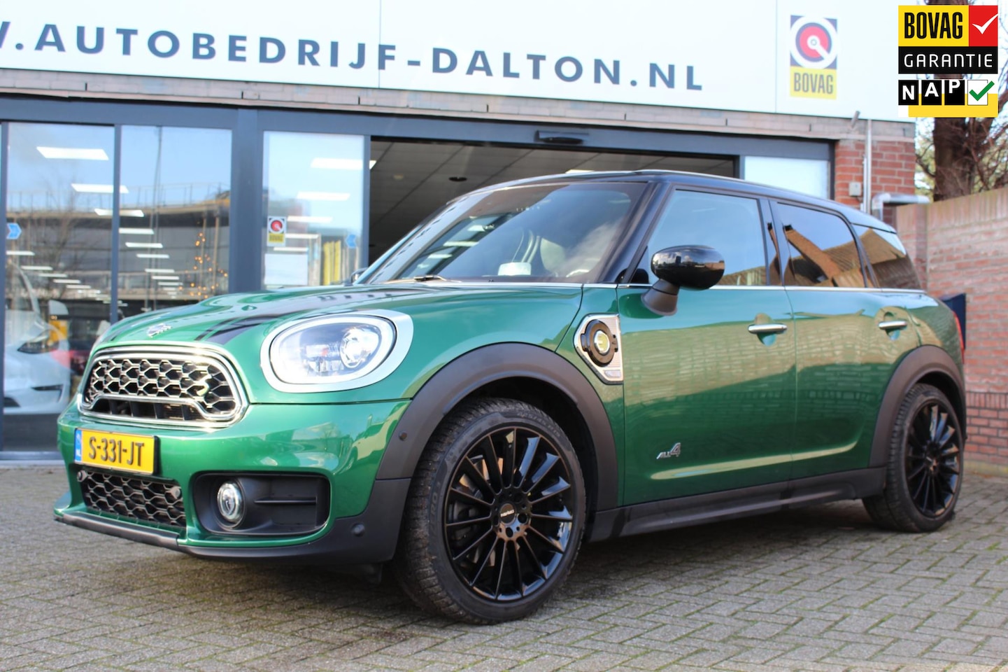 MINI Countryman - Mini 2.0 Cooper S E ALL4 Chili HYBRID / PANORAMADAK / LEER / POP UP - AutoWereld.nl