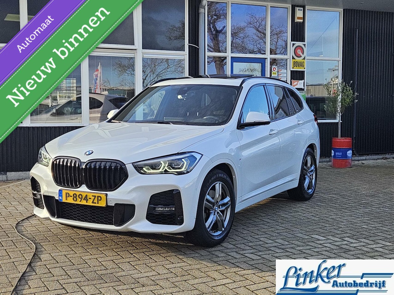 BMW X1 - sDrive20i Business Edition Plus M-SPORT NL-AUTO PANO TREKH - AutoWereld.nl