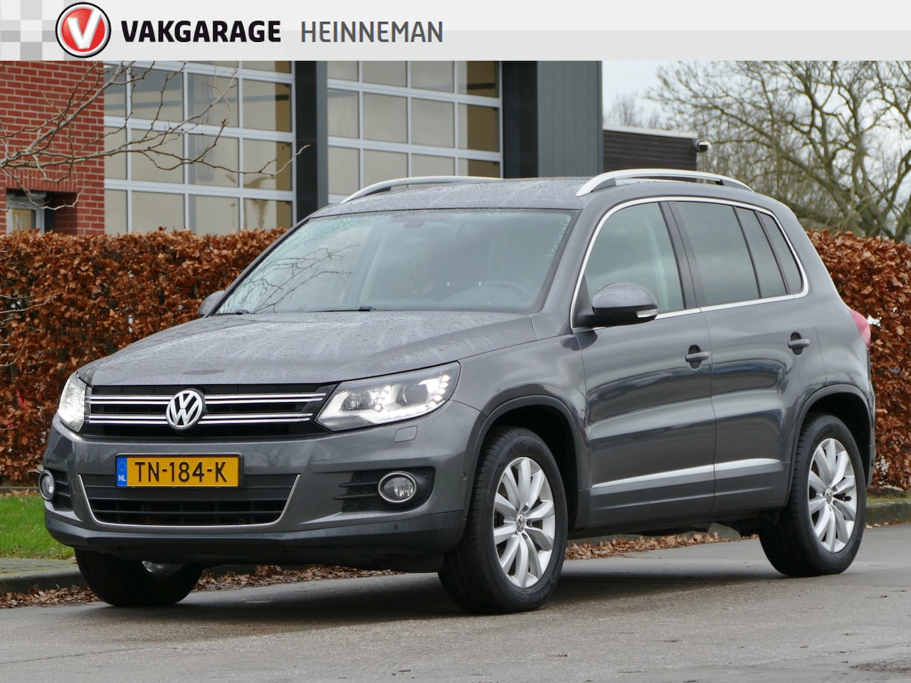 Volkswagen Tiguan - 1.4 TSI stoelverwarming | trekhaak | parkeerassistent - AutoWereld.nl