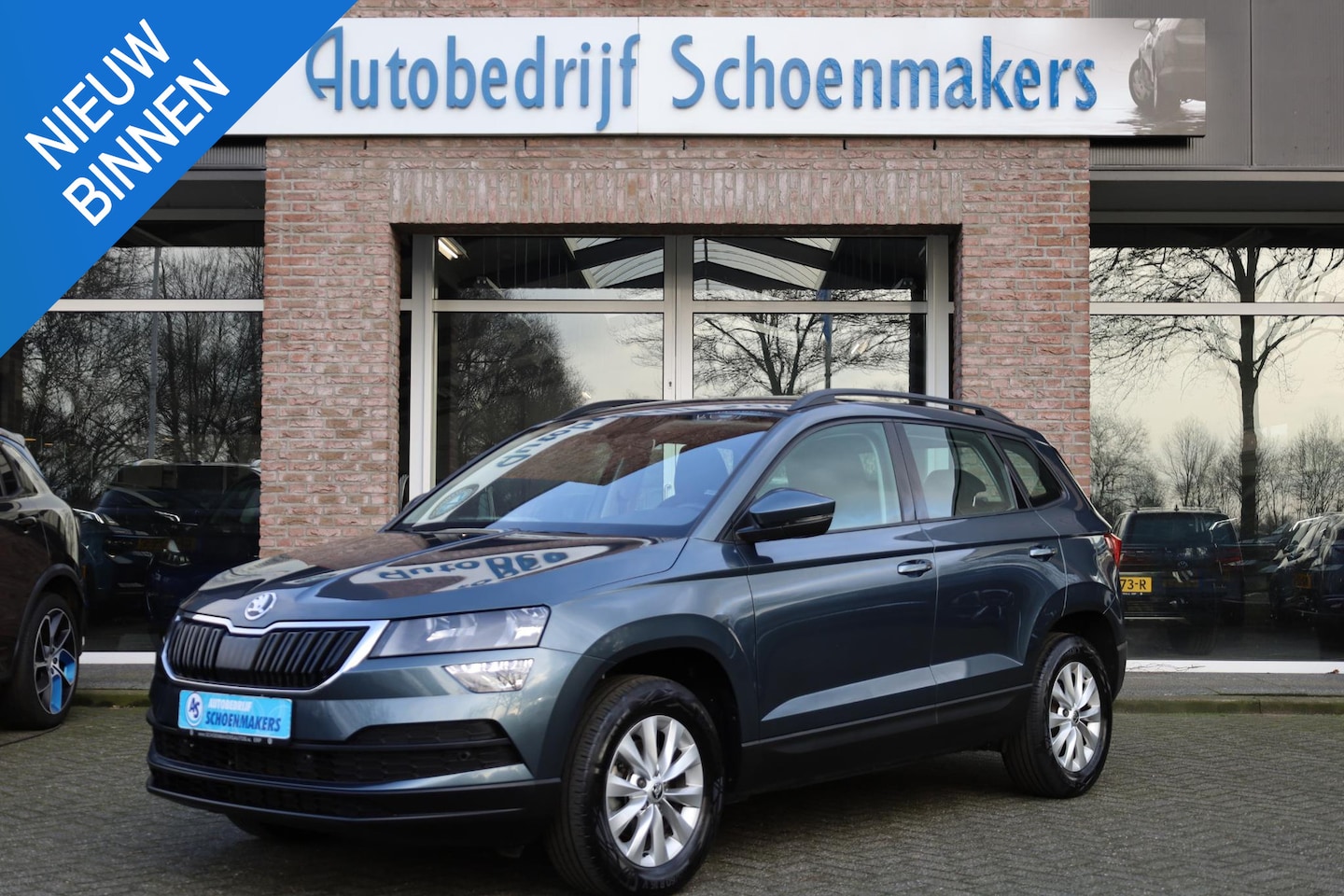 Skoda Karoq - 1.5 TSI ACT Ambition Business TREKHAAK CAMERA CARPLAY DAB NAVI SFEERVERLICHTING STOELVERWA - AutoWereld.nl