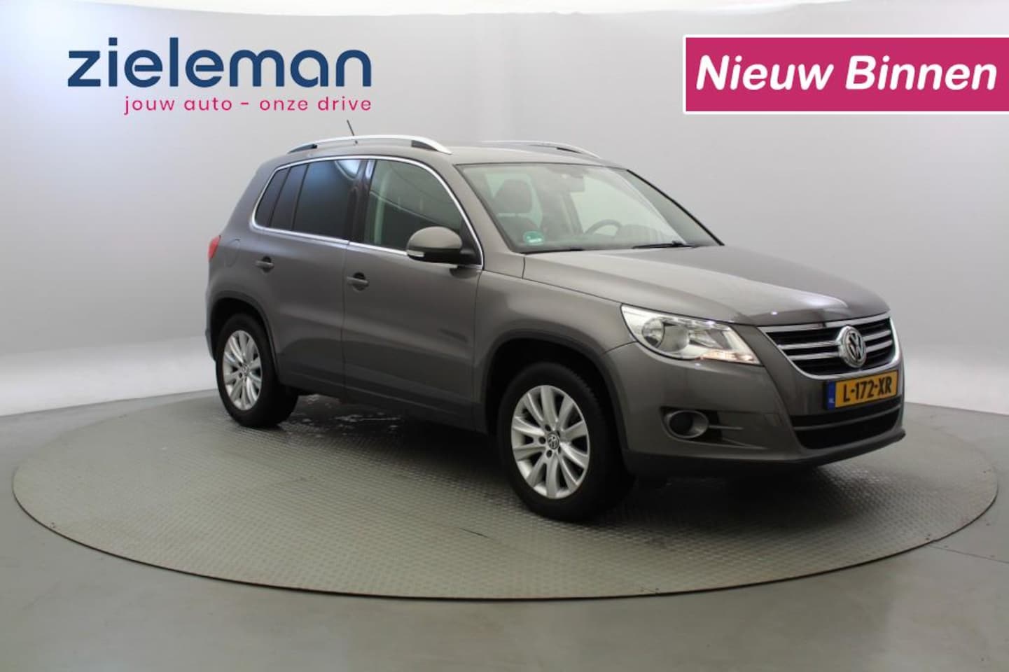 Volkswagen Tiguan - 1.4 TSI Comfortline - Clima, Cruise, Trekhaak - AutoWereld.nl