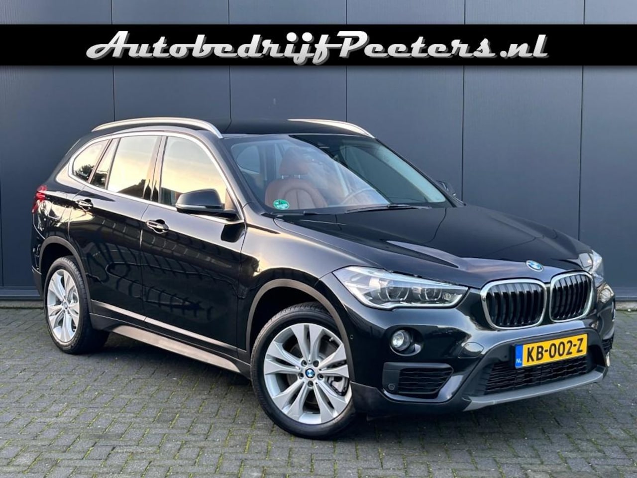 BMW X1 - sDrive20i Aut. 1e eigenaar Leder LED Navi Cruise Trekhaak - AutoWereld.nl