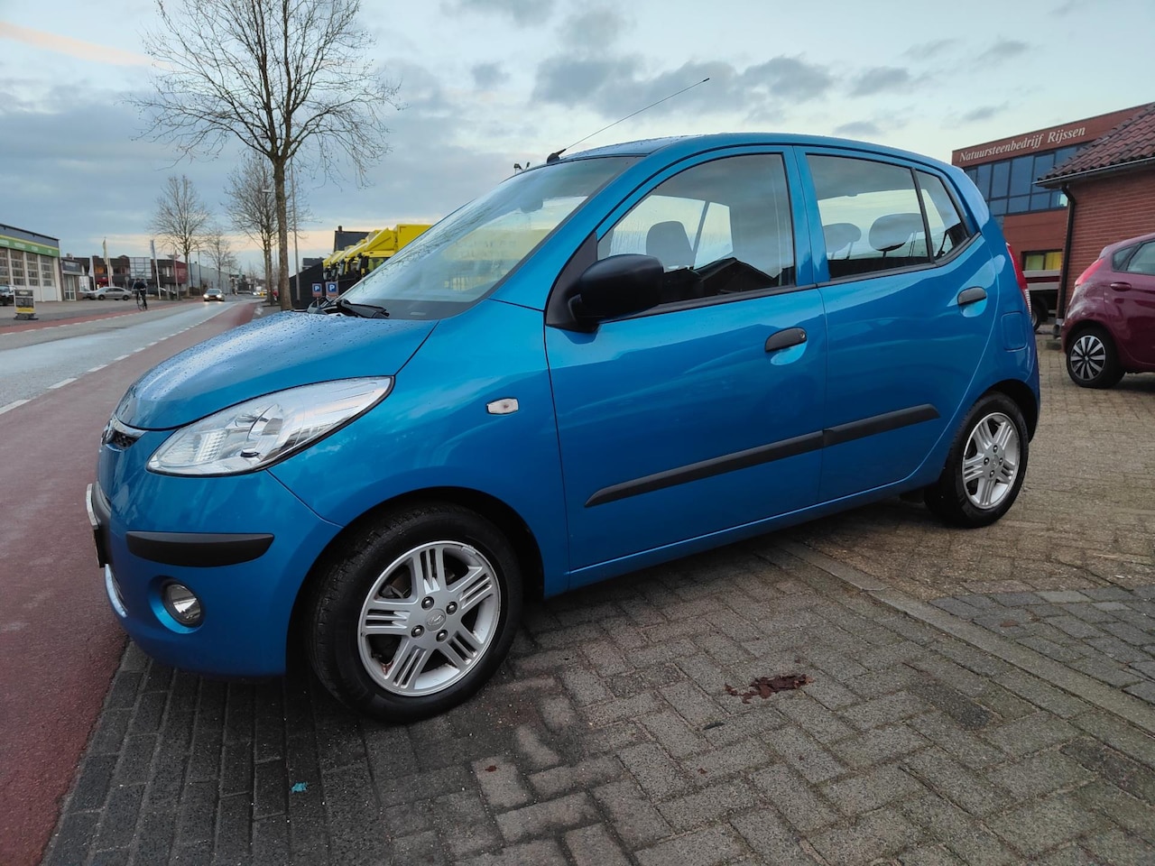 Hyundai i10 - 1.1 Active Orange Babies 1e eigenaar - AutoWereld.nl