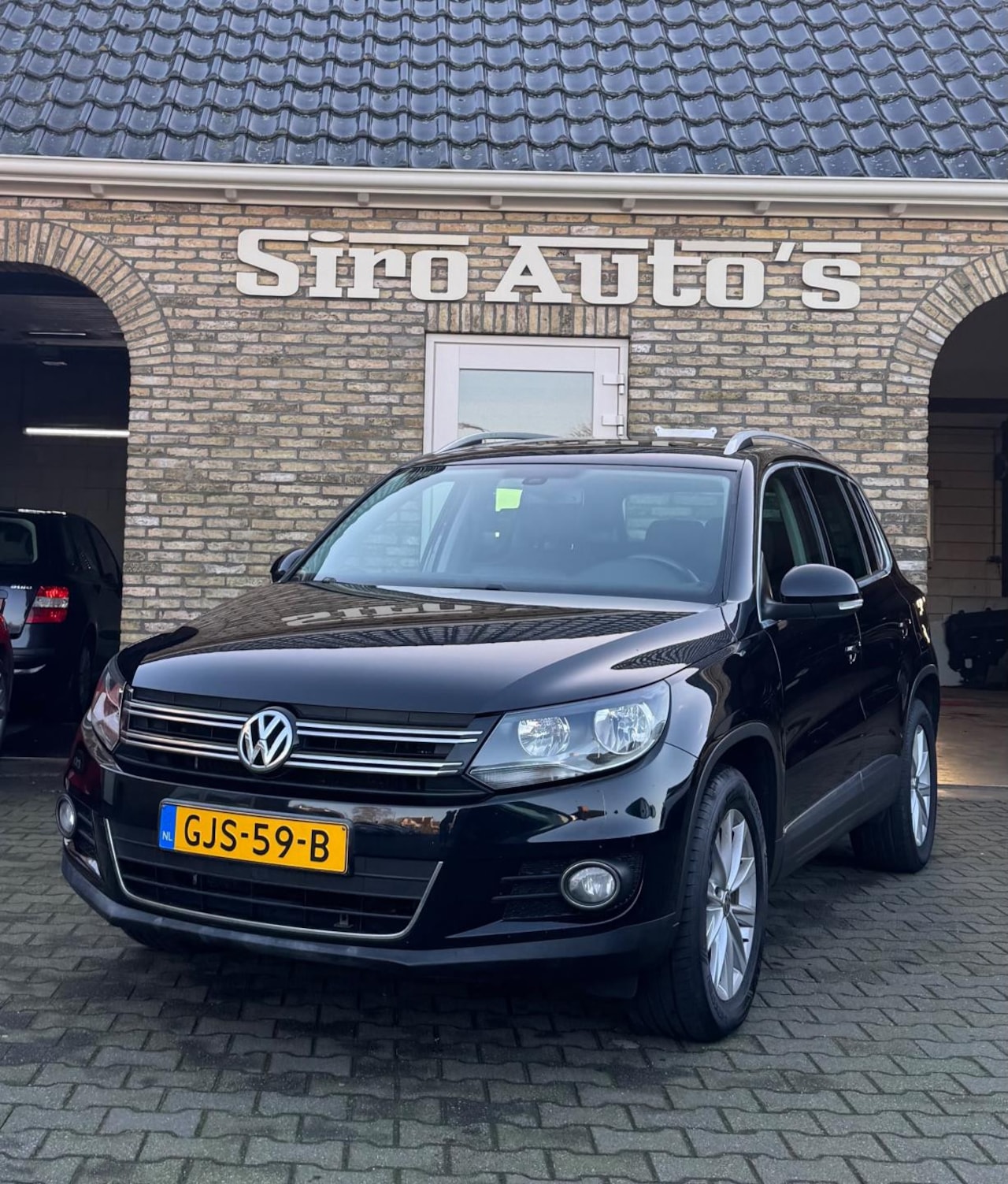 Volkswagen Tiguan - 2.0 TDI Comfort&Designi Bj 2013 weinig kilometers - AutoWereld.nl