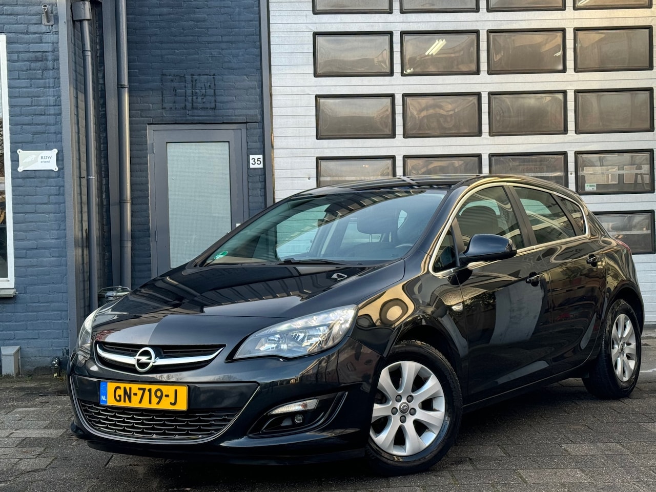 Opel Astra - 1.4 Edition | Airco | Navi | Cruise | PDC | N.A.P - AutoWereld.nl