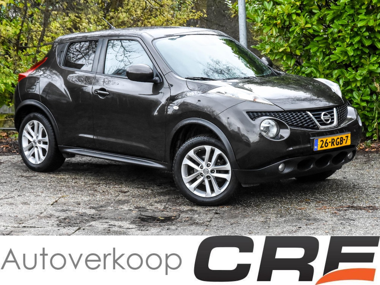 Nissan Juke - 1.6 Acenta / handbak / airco / cruise / alcantara / LM-velgen / privacy glass / 4-elek. Ra - AutoWereld.nl