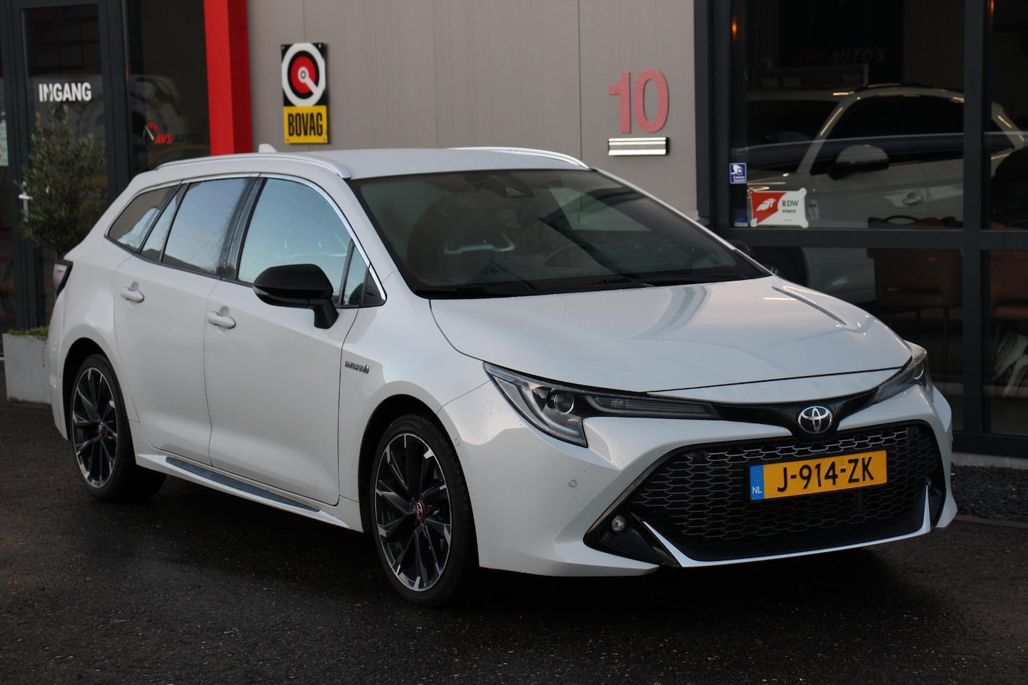 Toyota Corolla Touring Sports - 2.0 Hybrid Business GR-Sport 87DKM, Head-UP, TREKHAAK - AutoWereld.nl