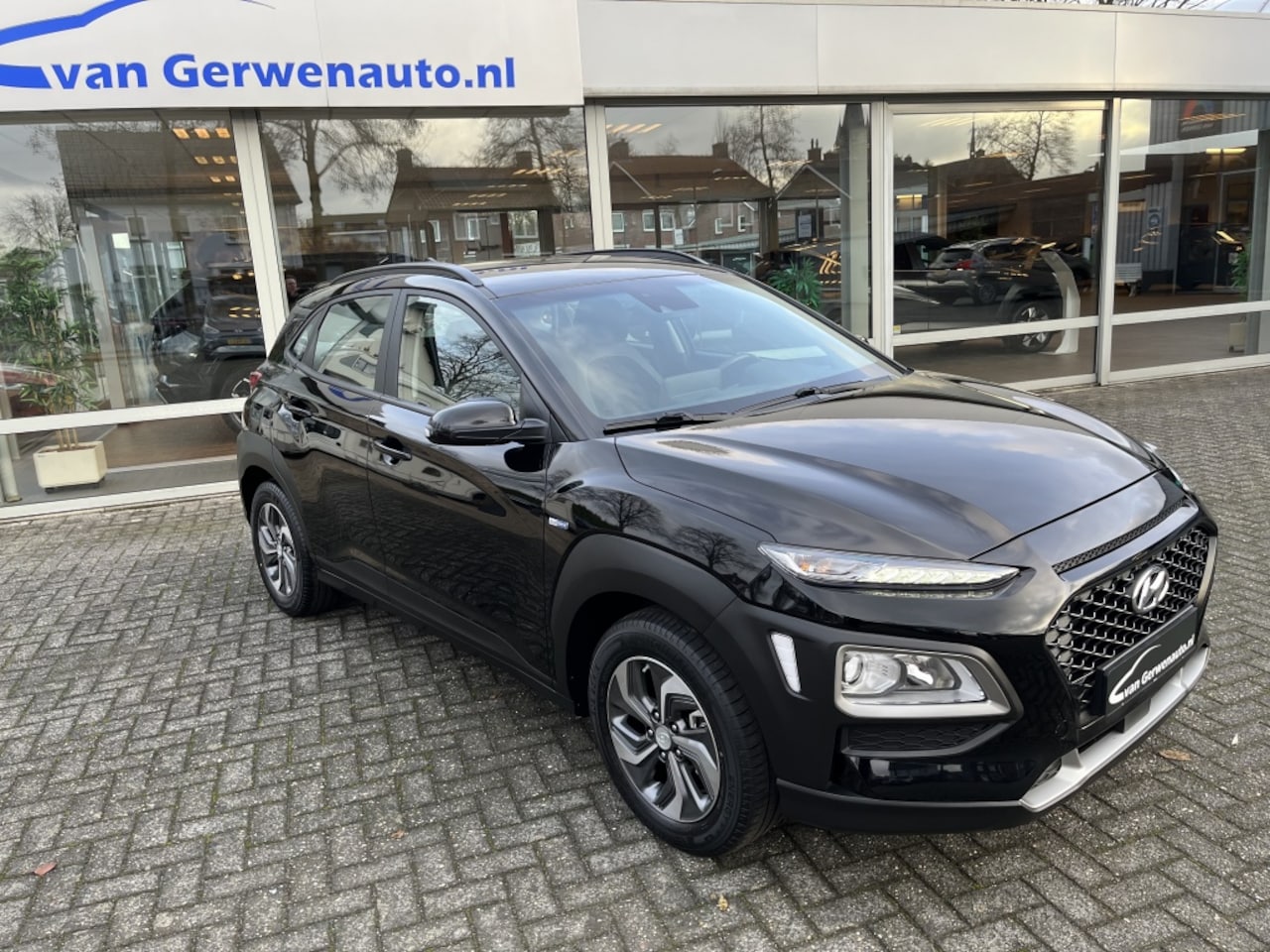 Hyundai Kona - 1.6 GDI HEV Comf Smart | Apple carplay | Navi | Camera | Trekhaa - AutoWereld.nl