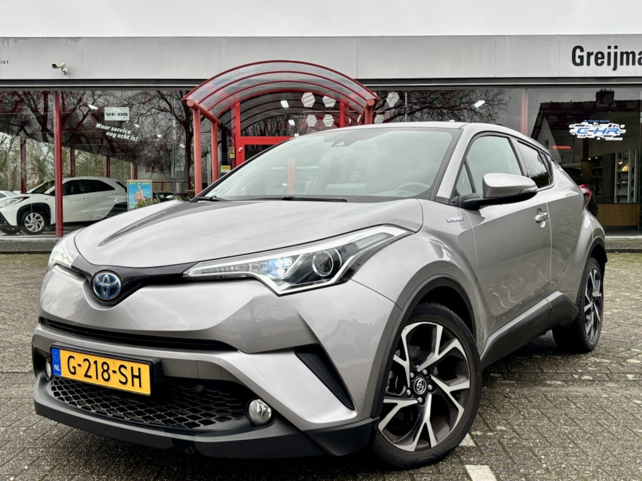 Toyota C-HR - 1.8 Hybrid Dynamic | Navigatie | Stoelverwarming | 18'' Lmv - AutoWereld.nl