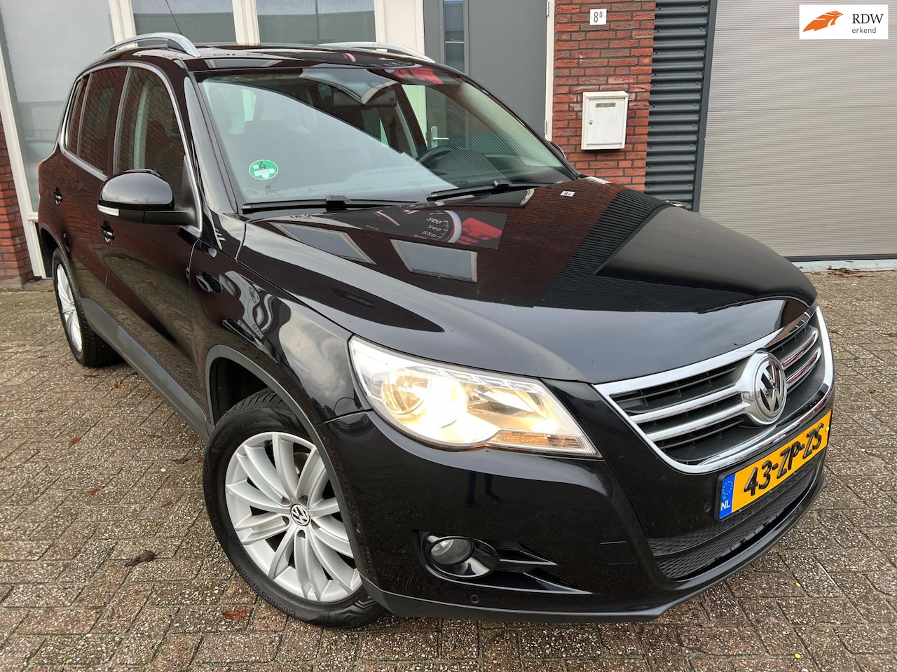 Volkswagen Tiguan - 1.4 TSI Sport&Style 4Motion / Pano / Clima / Cruise / PDC - AutoWereld.nl