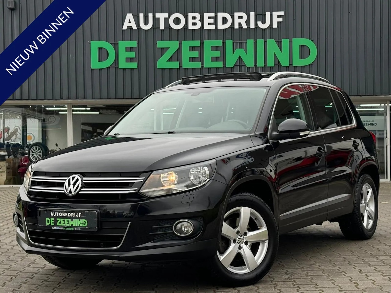 Volkswagen Tiguan - 1.4 TSI Comfort&Design|Pano|stoelverwarming - AutoWereld.nl