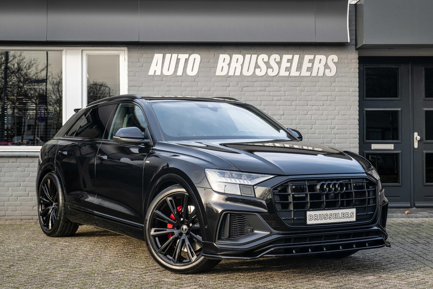 Audi Q8 - 55 TFSI e quattro Pro S-Line Competition Audi Exclusive Rood stiksel interieur SQ8 style - AutoWereld.nl