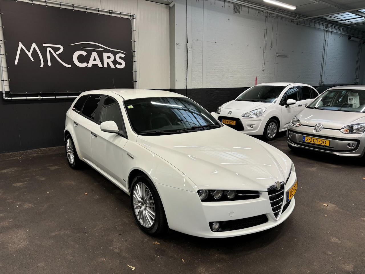 Alfa Romeo 159 Sportwagon - 2.0 JTD ECO Distinctive 2.0 JTD ECO Distinctive - AutoWereld.nl