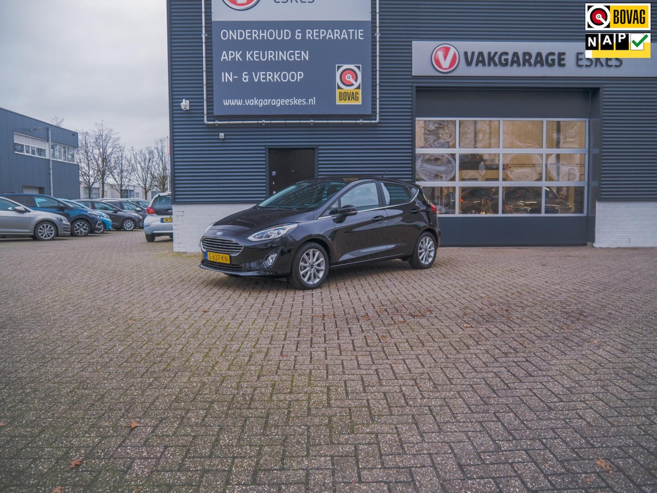 Ford Fiesta - 1.0 EcoBoost Titanium (NAVIGATIE, CLIMA, CAMERA, PDC voorz. - AutoWereld.nl