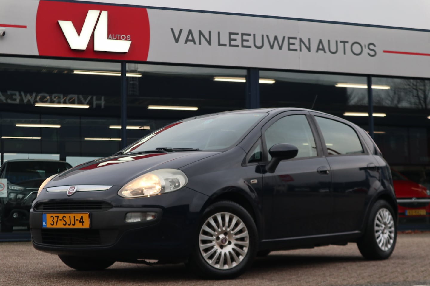 Fiat Punto Evo - 1.3 M-Jet Dynamic | Airco | Cruise | Trekhaak - AutoWereld.nl