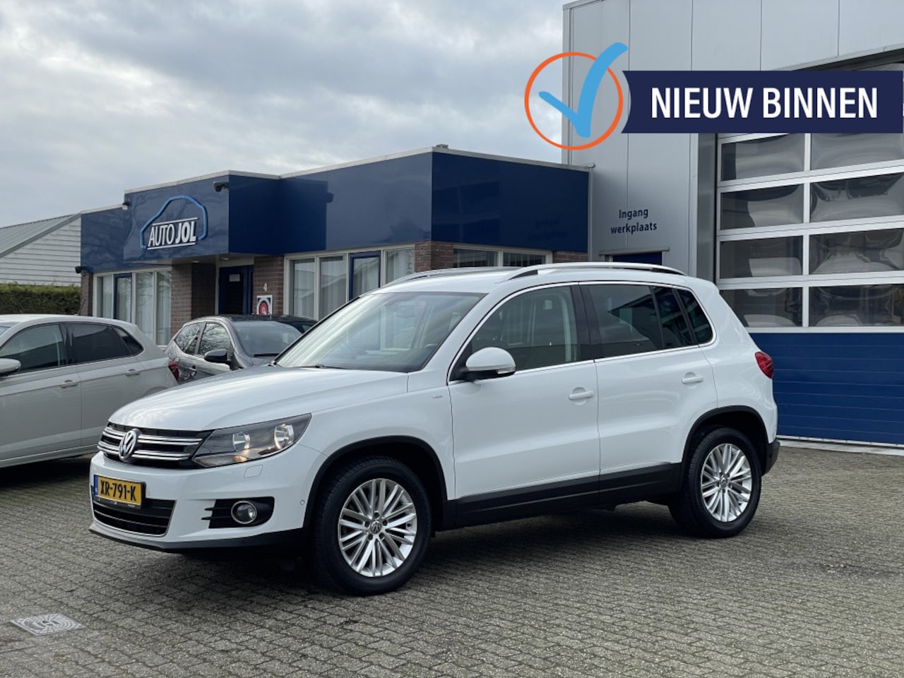 Volkswagen Tiguan - 1.4 TSI Sport&Style | stoelverwarming - AutoWereld.nl