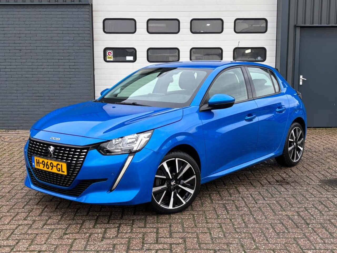 Peugeot 208 - 1.2 PureTech Allure 100Pk l GT Velgen l 3-D Cockpit l Keyless entry - AutoWereld.nl