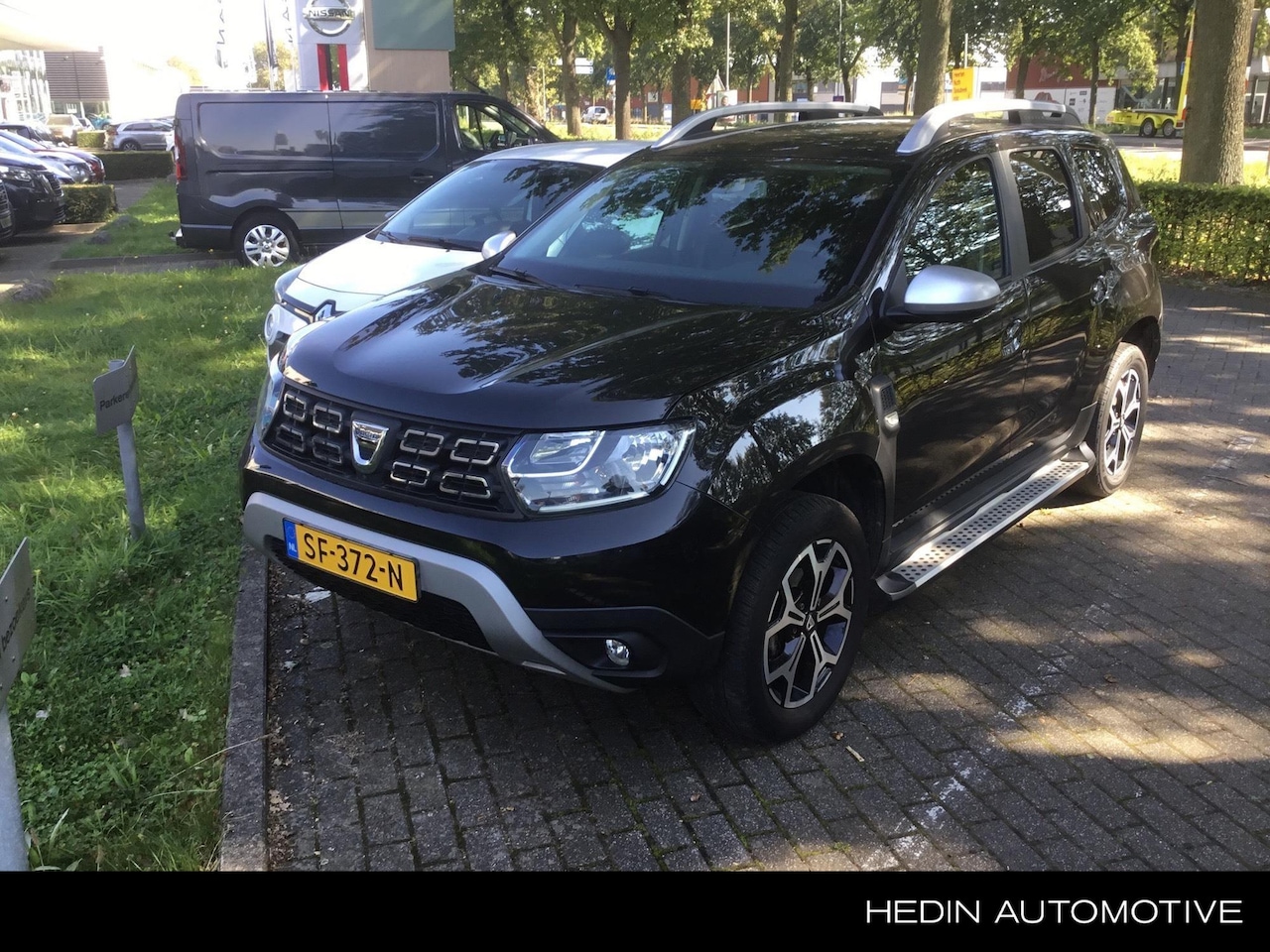 Dacia Duster - 1.2 TCe Prestige 1.2 TCe Prestige 125PK, 1ste eig., Sidesteps, 360 Camera, Trekhaak - AutoWereld.nl