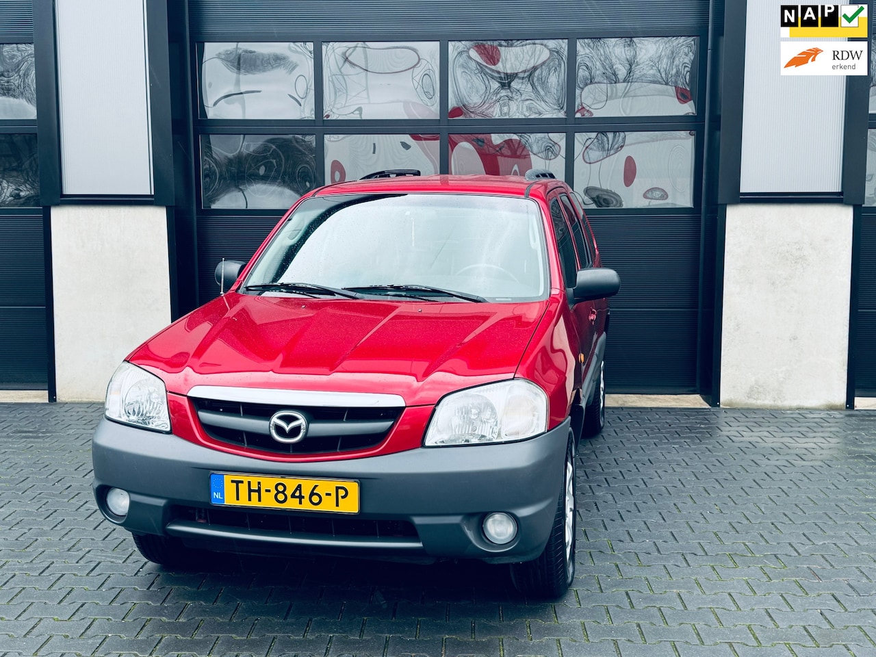 Mazda Tribute - 2.0 Exclusive 4WD | NIEUWSTAAT | airco | leer | cruise | - AutoWereld.nl