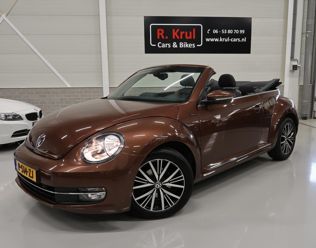 Volkswagen Beetle Cabriolet - 1.2 TSI Allstar Navigatie Airco-ecc Camera Cruise control Extra meters 2e Eigenares Boekje - AutoWereld.nl