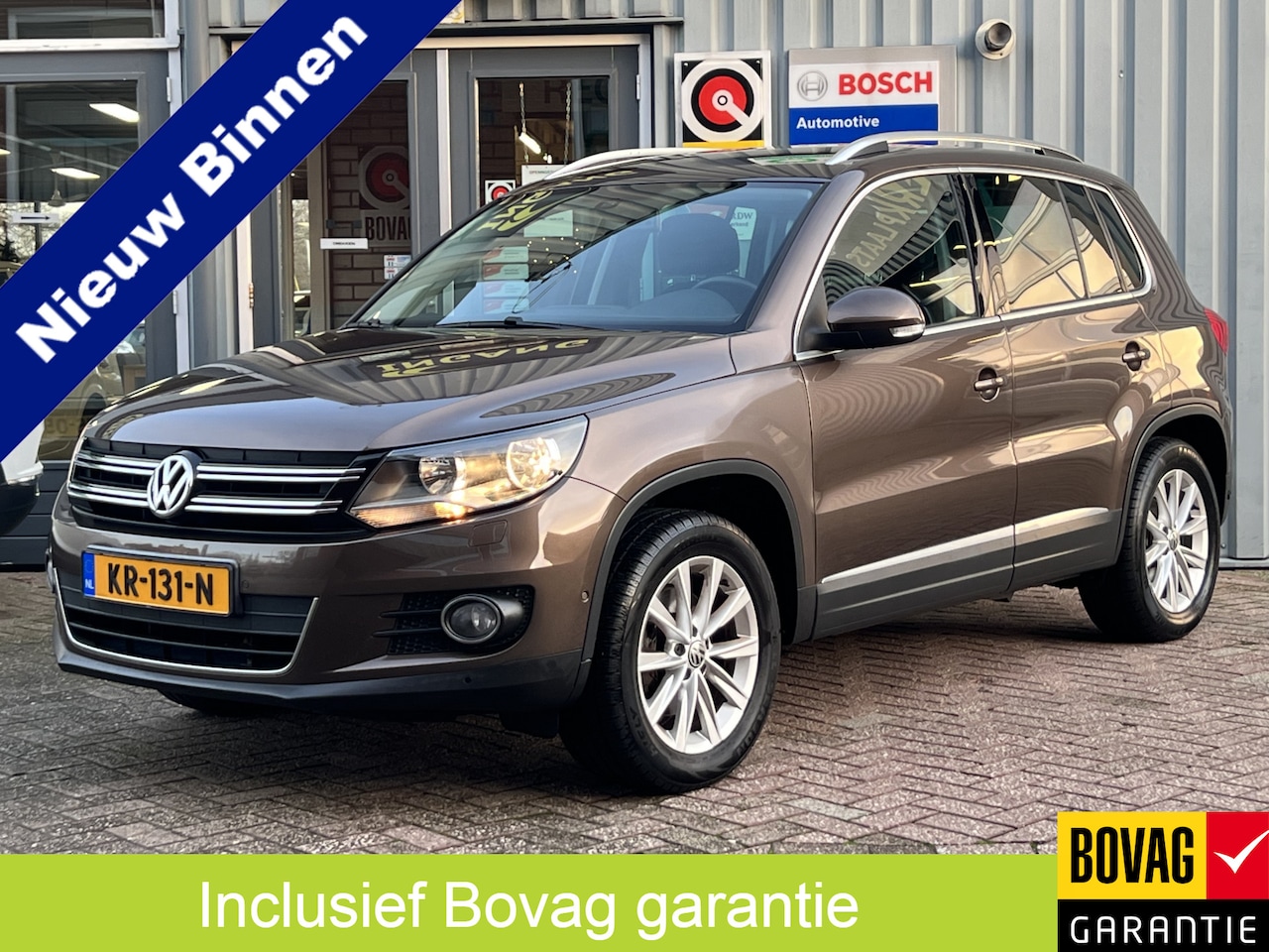 Volkswagen Tiguan - 1.4 TSI Sport&Style | TREKHAAK | NAVIGATIE | CRUISE | CLIMA | - AutoWereld.nl