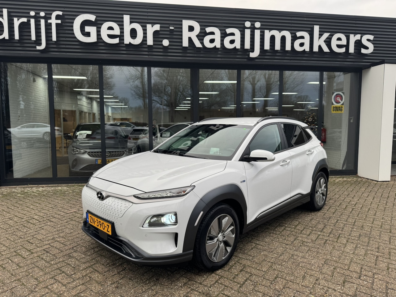 Hyundai Kona Electric - EV Premium 64 kWh*Leder*Navi*Camera*EXPORTPRIJS* - AutoWereld.nl